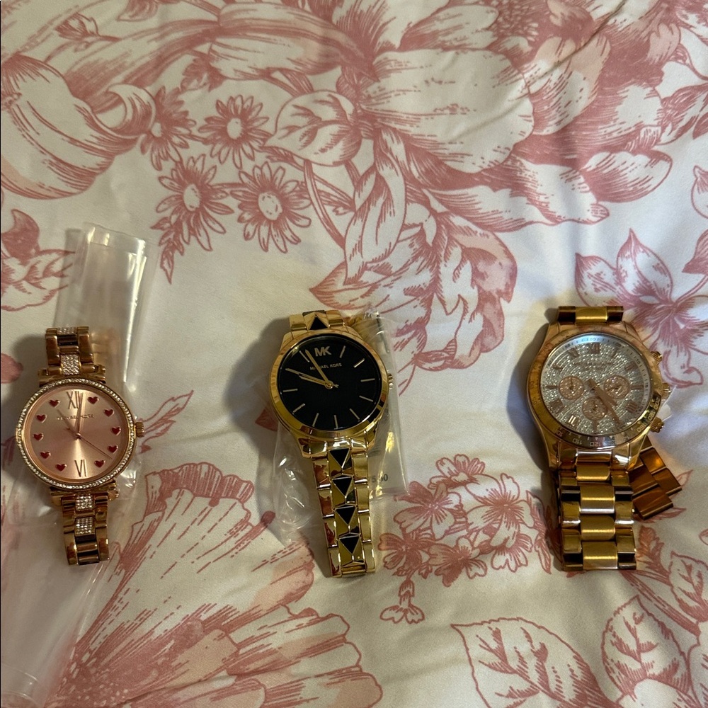 Michael Kors Collection Pink, Black, and Gold Watches